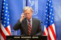 US national security adviser John Bolton adjusts his spectacles as he gives a press conference in Jerusalem on August 20, 2018