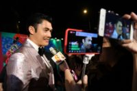 British-Malaysian actor Henry Golding, who stars as Nick Young in Crazy Rich Asians, attends the Singapore premiere of the movie on Wednesday