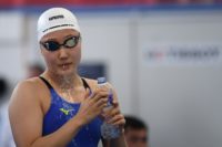 The Chinese swimmer, who was not named, kicked South Korea's Kim Hye-jin (pictured) and the pair had to be separated by athletes and coaches, the report said