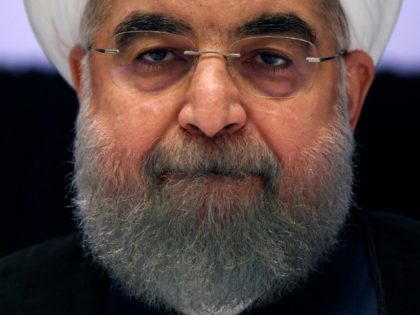 Under fire, Iran's Rouhani calls for unity