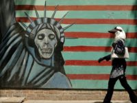 A mural on the wall of the former US embassy in the Iranian capital Tehran. US President Donald Trump has imposed biting sanctions on Iran, triggering a mix of anger, fear and defiance Iran to open lawsuit against US sanctions at ICJ