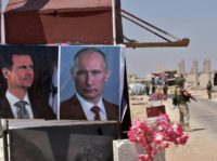 Russian President Vladimir Putin (R) is the biggest backer of Syrian leader Bashar al-Assad (L) Assad staying in power would be 'grotesque error': Macron