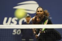 On song: Serena Williams on the way to a US Open third-round victory over her sister Venus on Friday.