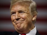 APTOPIX Trump Donald Trump Supporters listen as President Donald Trump smiles during a campaign rally at Florida State Fairgrounds Expo Hall, Tuesday, July 31, 2018, in Tampa, Fla. (AP Photo/Evan Vucci) Donald Trump