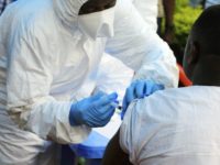 Congo Ebola A healthcare worker from the World Health Organization gives an Ebola vaccination to a front line aid worker in Mangina, Democratic Republic of Congo, Wednesday, Aug 8, 2018. Health experts began Ebola vaccinations in Congo's northeast village of Mangina for the latest deadly outbreak that has already claimed at least nine lives. (AP Photo/Al hadji Kudra Maliro) A healthcare worker from the World Health Organization gives an Ebola vaccination to a front line aid worker in Mangina, Democratic Republic of Congo, Wednesday, Aug 8, 2018. Health experts began Ebola vaccinations in Congo's northeast village of Mangina for the latest deadly outbreak that has already claimed at least …