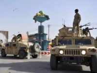 US Afghanistan War Strategy In this Sunday, Aug. 12, 2018, photo, Afghan security personnel patrol in the city of Ghazni province west of Kabul, Afghanistan. A Taliban assault on Ghazni, a key city linking areas of Taliban influence barely 75 miles from Kabul, has killed about 100 Afghan policemen and soldiers since Friday, the Afghan Defense Ministry said. A year after the Trump administration introduced its strategy for Afghanistan, the Taliban are asserting themselves on the battlefield even as U.S. officials talk up hopes for peace. That’s raising questions about the viability of the American game plan for ending a war that began when some of the current U.S. troops were in diapers. (AP Photo/Mohammad Anwar Danishyar) Assaults by Taliban raise questions about US plan for peace