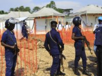 Congo Ebola Police officers stand guards at a newly established Ebola response center in Beni, Democratic Republic of Congo, Friday, Aug. 10, 2018. The World Health Organization’s director general says instability, high population density and large displacement in Congo’s east mean the response to the nation’s tenth Ebola virus outbreak must be stronger than ever before. (AP Photo/Al hadji Kudra Maliro) Congo's latest Ebola outbreak taking place in a war zone