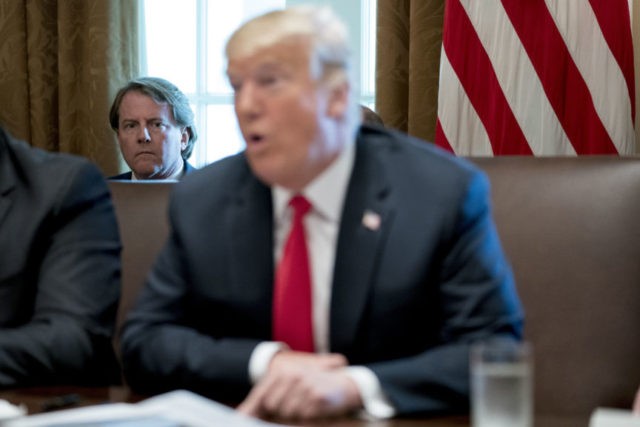 Trump Donald Trump, Donald McGahn FILE In this Aug. 16, 2018, file photo White House counsel Donald McGahn, left, listens as President Donald Trump speaks during a cabinet meeting in the Cabinet Room of the White House in Washington. Trump insisted Sunday, Aug. 19, that McGahn isn't "a John Dean type 'RAT,'" making reference to the Watergate era White House attorney who turned on Richard Nixon. Trump, in a series of angry tweets, blasted a New York Times story reporting that McGahn has been cooperating extensively with the special counsel team investigating Russian election meddling and potential collusion with Trump's Republican campaign. (AP Photo/Andrew Harnik, File) The Associated Press
