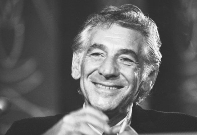 Music Bernstein at 100 Leonard Bernstein In this July 26, 1971 file photo conductor Leonard Bernstein tells reporters in Washington that the work he is preparing for the 1971 opening of the John F. Kennedy Center for the Performing Arts is a "labor of love." Leonard Bernstein is getting a musical tribute that’s off the charts on the 100th anniversary of the maestro’s birth. The Boston Symphony Orchestra will be joined by musicians from the New York Philharmonic, Vienna Philharmonic Orchestra, Israel Philharmonic Orchestra and other groups when it takes the stage Saturday, Aug. 25, 2018 at its summer home at Tanglewood in Massachusetts. Performers include Yo Yo Ma. Bernstein wrote the score to “West Side Story” and won a slew of Grammys. (AP Photo/Charles Harrity, File) The Associated Press