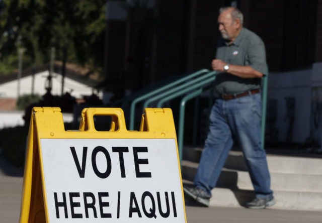 Arizona Primary A man exits his polling station for voting in the Arizona primary, Tuesday, Aug. 28, 2018, in Tempe, Ariz. (AP Photo/Matt York) The Associated Press