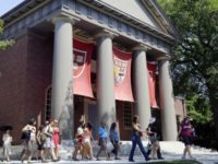 Havard Race In Admissions Harvard University In this Aug. 30, 2012, file photo, a tour group walks through the campus of Harvard University in Cambridge, Mass. The Justice Department has sided with Asian American students suing Harvard University over the Ivy League school's consideration of race in its admissions policy. (AP Photo/Elise Amendola, File) The Associated Press