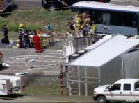 The Latest: Highway partially open after bus-truck crash