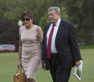 Melania Trump's parents take citizenship oath