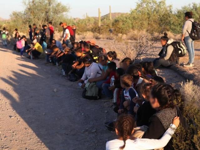 Tucson Sector Border Patrol agents apprehend a group of 121 illegal aliens north of the Lu