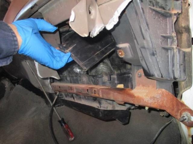 U.S. Customs and Border Protection officers find methamphetamine in the dashboard of a veh