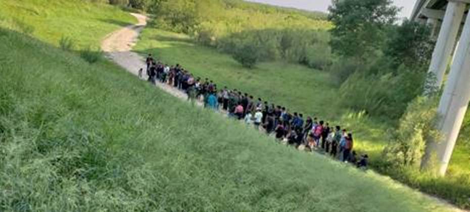 Border Patrol agents find a large group of migrant families and minors crossing the border illegally near Rincon Village in South Texas. (Photo: U.S. Border Patrol/Rio Grande Valley Sector)