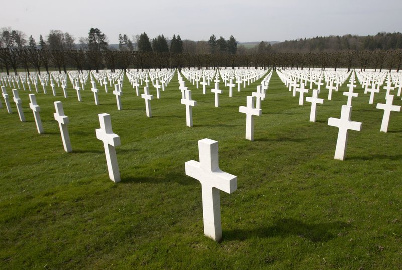 FILE - In this March 24, 2017 file photo, a view of rows of crosses of American World War I soldiers at the Meuse-Argonne American cemetery in Romagne-sous-Montfaucon. It was America’s largest and deadliest battle ever, with 26,000 U.S. soldiers killed and tens of thousands wounded. A hundred years ago, the Meuse-Argonne offensive contributed to bring an end to of World War One. (AP Photo/Virginia Mayo, File)