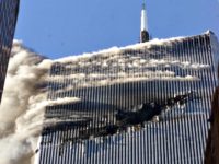 911 Plane Hijacking Smoke pours from a gaping hole and the upper floors of the World Trade Center's North Tower, shortly after hijackers crashed American Airlines Flight 11 into the building on September 11, 2001 in New York City. #