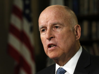 FILE - In this Sept. 10, 2018 file photo, Gov. Jerry Brown speaks during an interview with The Associated Press, in Sacramento, Calif. California has become the first state to require publicly traded companies to include women on their boards of directors by 2020, according to a law signed Sunday, …