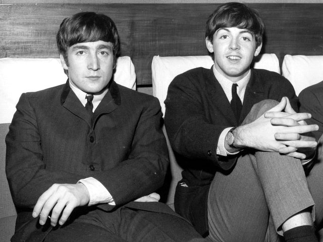 1st November 1963: Two members of Liverpudlian pop group The Beatles, John Lennon (1940 - 1980), singer and guitarist, left, and Paul McCartney, singer and bass guitarist. (Photo by Fox Photos/Getty Images)