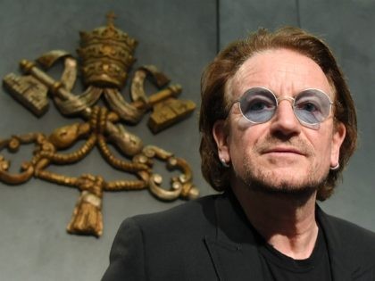 Frontman of the Irish band U2 Paul David Hewson, known by his stage name Bono, gives a press conference after a meeting with Pope Francis at Vatican on September 19, 2018. (Photo by Tiziana FABI / AFP) (Photo credit should read TIZIANA FABI/AFP/Getty Images)