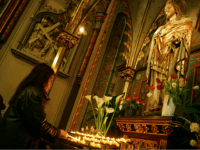 Catholic church netherlands Worshippers light candles and pray next to a statue of Jesus in a Roman Catholic church in Amsterdam, Netherlands, Friday April 1, 2005. Pope John Paul II is in grave condition, the vatican said Friday, but it said he is lucid and spent the morning celebrating mass and receiving top …