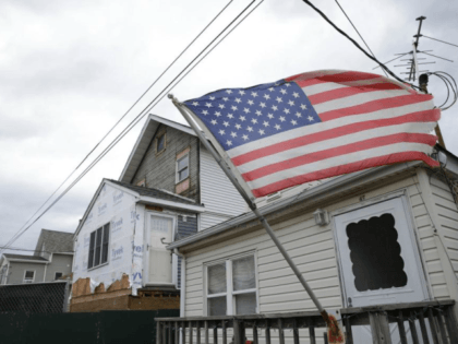Construction workers repair homes in Broad Channel, New York, on October 26, 2017. According to Census data Wednesday, the median annual household income in the United States climbed nearly 2 percent in 2017, to just under $61,400. File Photo by John Angelillo/UPI