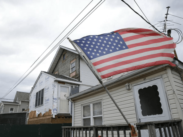 Construction workers repair homes in Broad Channel, New York, on October 26, 2017. Accordi