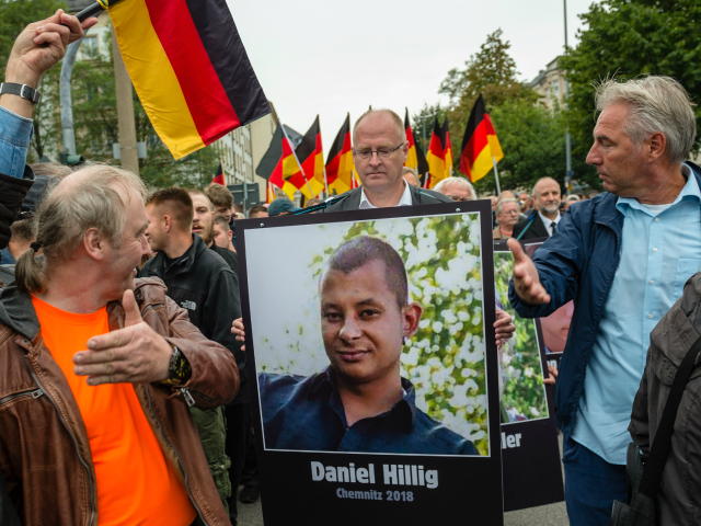 People take part in a march of silence organized by the right-wing Alternative for Germany