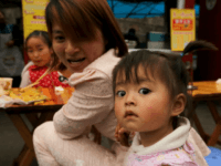 A young Chinese girl has lunch with her family in Jiayang, a small mountainous city in Sichuan Province. China, the world's most populous country, has a relatively small youth demographic, which was partially the result of China's one-child policy. File Pphoto by Stephen Shaver/UPI A young Chinese girl has lunch with her family in Jiayang, a small mountainous city in Sichuan Province. China, the world's most populous country, has a relatively small youth demographic, which was partially the result of China's one-child policy. File Pphoto by Stephen Shaver/UPI