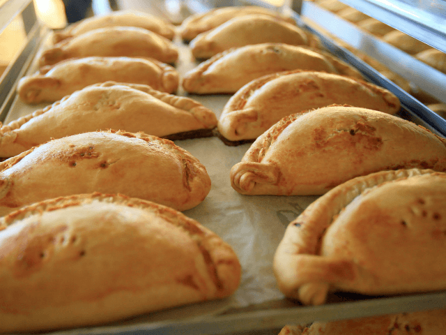 ST AUSTELL, ENGLAND - MARCH 03: Freshly baked pasties are taken out of the oven at the Wor