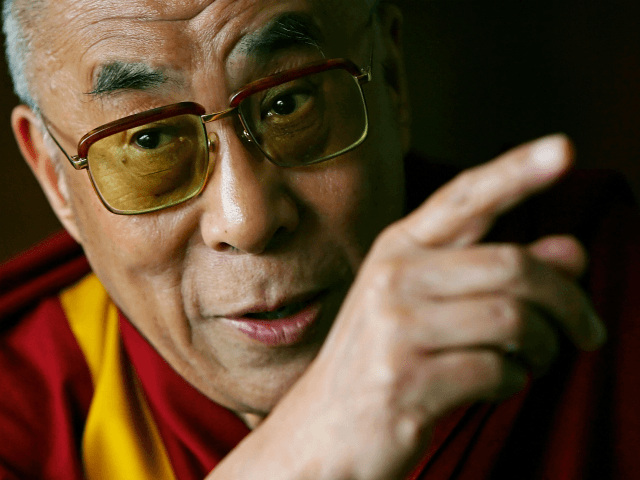 The Dalai Lama addresses journalists at his hotel in London on May 23, 2008. Prime Ministe