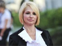 Ellen Barkin arrives at the opening ceremony of the 37th Deauville American Film Festival on September 2, 2011 in Deauville, France. (Photo by Francois Durand/Getty Images)