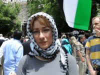 Ewa Jasiewicz of Poland poses after the memorial service to the victims of the Israeli raid on Gaza-bound aid ships at the Fatih Mosque in Istanbul on June 3, 2010. The nine victims were all aboard the Turkish ferry, Mavi Marmara, the lead ship of the aid flotilla, where most …