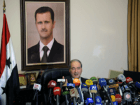 Faisal Mekdad This photo released by the Syrian official news agency SANA, Syrian Deputy Foreign Minister Faisal Mekdad, speaks during a news conference in Damascus, Syria, Saturday, March 10, 2018. Mekdad denied opposition charges that government forces used poison gas in their attacks on eastern Ghouta. Mekdad added that insurgents groups in …