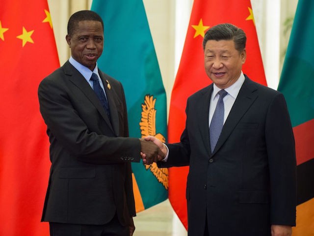 Zambia's President Edgar Lungu (L) shakes hands with China's President Xi Jinping before their bilateral meeting at the Great Hall of the People on September 1, 2018. - Lungu is in China for the Forum on China-Africa Cooperation which will be held in Beijing on September 3 and 4. (Photo by Nicolas ASFOURI / POOL / AFP) (Photo credit should read NICOLAS ASFOURI/AFP/Getty Images)