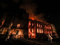 RIO DE JANEIRO, BRAZIL - SEPTEMBER 02: A fire burns at the National Museum of Brazil on September 2, 2018 in Rio de Janeiro, Brazil. The museum, which is tied to the Rio de Janeiro federal university and the Education Ministry, was founded in 1818 by King John VI of …