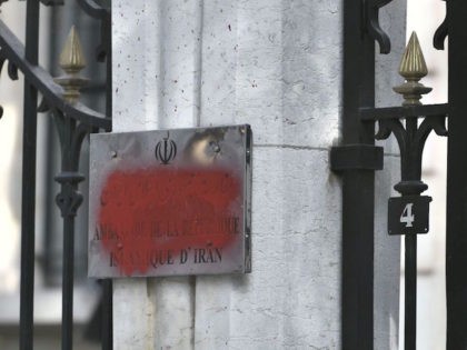 The vandalised sign of the Iranian Embassy in the French capital Paris on September 14, 20