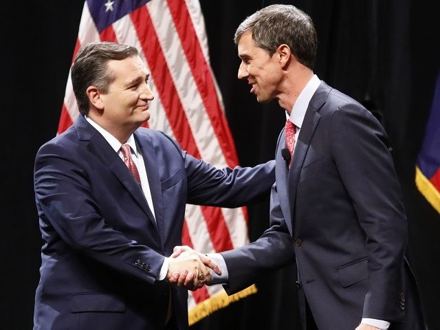 DALLAS, TX - SEPTEMBER 21: Sen. Ted Cruz (R-TX) and Rep. Beto O'Rourke (D-TX) shake h