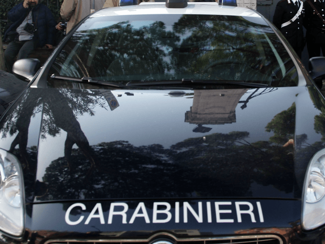 ROME, ITALY - DECEMBER 23: Carabiniere (Italian Special Police) stand in front of the Swiss Embassy after a parcel bomb exploded this morning on December 23, 2010 in Rome, Italy. A 53-year-old Swiss national seriously injured his hands as he opened the package. (Photo by Franco Origlia/Getty Images)