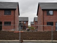 GLASGOW, SCOTLAND - OCTOBER 06: New housing under construction in the Govan area on October 6, 2015 in Glasgow, Scotland. Recent reports indicate that affordable housing in Scotland needs to be double what is currently being built at the moment. At least 12,000 homes need to be built every year …