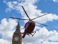 BRITAIN-POLITICS-TRANSPORT-HEALTH A London air ambulance takes off from Parliament Square in front of the Houses of Parliament after it arrived earlier as part of the response to an incident in which a man was injured after falling 15 feet at nearby Westminster Bridge in London on May 3, 2016. The man …