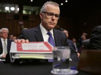 Intelligence Chiefs Testify At Senate Intelligence Hearing On World Wide Threats WASHINGTON, DC - MAY 11: Acting FBI Director Andrew McCabe and the other heads of the U.S. intelligence agencies prepare to testify before the Senate Intelligence Committee in the Hart Senate Office Building on Capitol Hill May 11, 2017 in Washington, DC. The intelligence officials were questioned by the committee …
