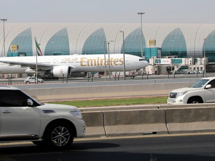 A picture taken on August 10, 2017, shows an Emirates airline Boeing 777 parked on the tar