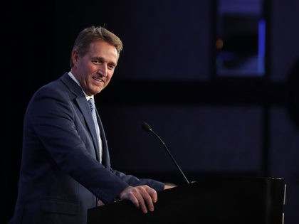 WASHINGTON, DC - JANUARY 25: Sen. Jeff Flake (R-AZ) delivers remarks during the U.S. Conference of Mayors 86th annual Winter Meeting at the Capitol Hilton January 25, 2018 in Washington, DC. Flake spoke during the conference's Childhood Obesity Prevention Awards Luncheon which was sponsored by the American Beverage Association, whose …
