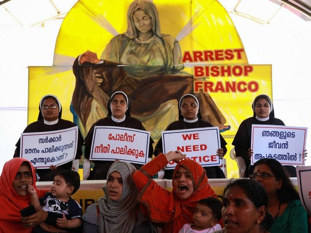 Indian Christian nuns and Muslim supporters protest as they demand the arrest of Bishop Fr