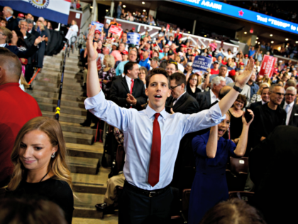 Republican Senate candidate Josh Hawley dances before President Donald Trump speaks during a campaign rally, Friday, Sept. 21, 2018, in Springfield, Mo.