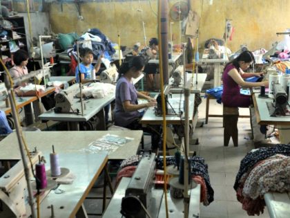 Laborers in a garment workshop on the outskirts of Hanoi in Vietnam