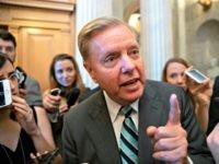 Lindsey Graham to Reporters Sen. Lindsey Graham, R-S.C., a member of the Senate Judiciary Committee, makes a point to reporters about Brett Kavanaugh's accusers as he arrives for a vote at the Capitol in Washington, Wednesday, Sept. 26, 2018.