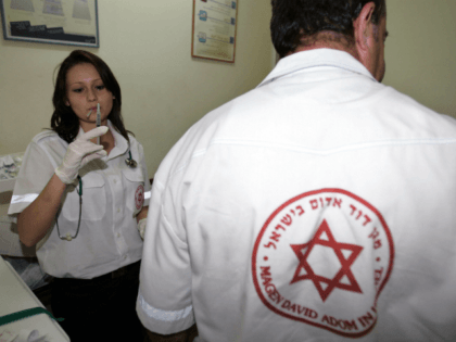 Israeli-Russian Yulia Tskhay, 17, a fully trained medic is seen at the Magen David Adom (MDA) center 05 September 2006, in her hometown of Tiberias on the shores of the Sea of Galilee. In Israel, where life is regulated by security alerts and years of conflict, thousands of teenagers spend …